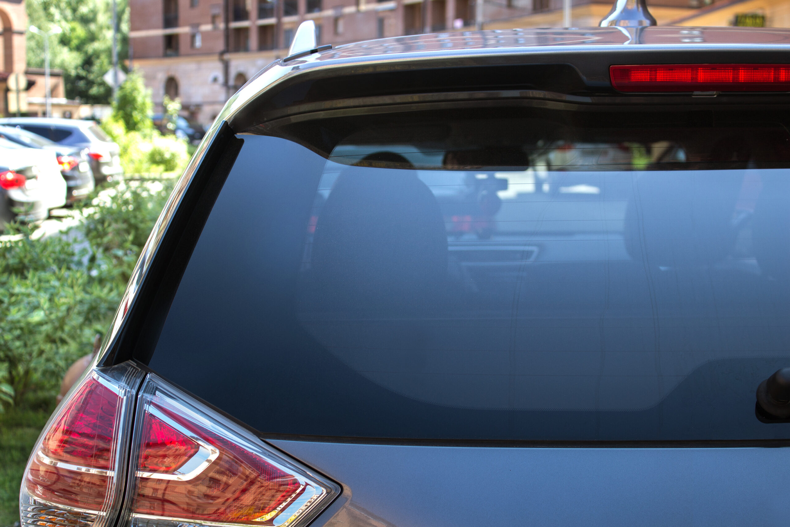 What Triggers a Need for Auto Back Glass Installation & Repair in Redmond